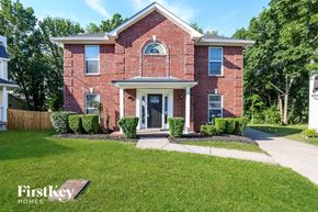Antioch house for rent - a brick house with a lawn in front of it