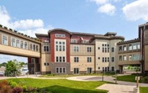 Watertown apartment for rent - an exterior view of a building on a campus