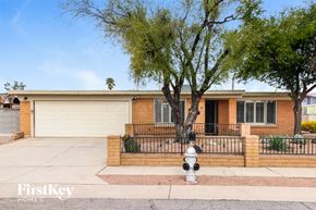 Tucson house for rent - a house with a fire hydrant in front of it