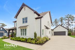 Helena house for rent - a white house with white siding and a garage