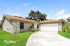 Jacksonville house for rent - a house with a garage and a driveway