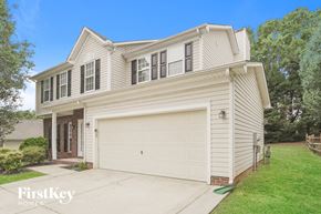 Concord house for rent - A two-story house with a garage is for sale.