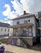 Donora house for rent - a picture of a house with a car parked in front of it
