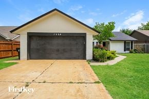Norman house for rent - A garage with the number 1529 on it.