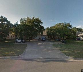 Georgetown apartment for rent - a house with a car parked in the driveway