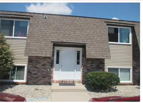 Lima apartment for rent - the front of a brick house with a white door