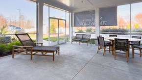 Huntersville apartment for rent - the lobby of a building with chairs and tables
