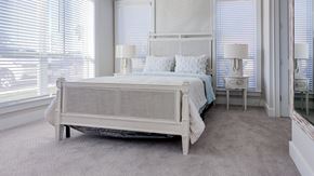 Huntersville apartment for rent - a bedroom with a bed and two windows