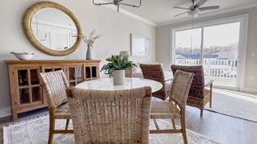 Huntersville apartment for rent - a dining room with a table and chairs and a window