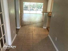 Cape Coral house for rent - a empty house with a large empty room and a window