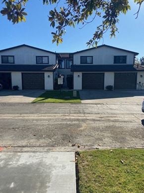Santa Maria house for rent - A two-story house with a garage on the side.