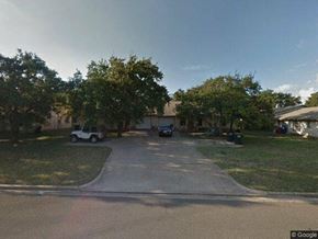 Georgetown apartment for rent - a house with cars parked in a driveway