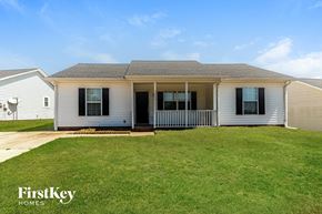 High Point house for rent - A house with a lawn in front of it.