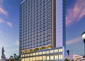 New Brunswick apartment for rent - A tall building with a statue in front of it.