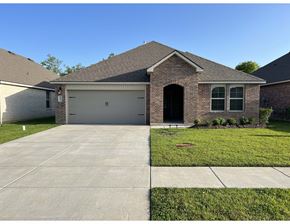Youngsville house for rent - a house with a driveway and a garage door