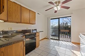 Naperville apartment for rent - A kitchen with a sink, stove, and oven.