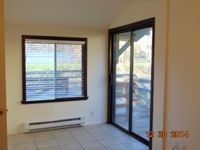 Eagle Point apartment for rent - A room with a window and sliding glass door.