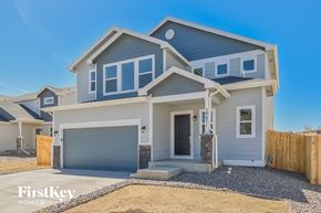 Colorado Springs house for rent - A modern two-story house with a garage is for sale by FirstKey Homes.