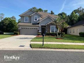 Fleming Island house for rent - a house with a driveway and a parking meter