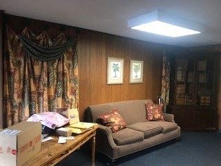 Watertown apartment for rent - a living room with a couch and a table