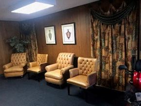 Watertown apartment for rent - a waiting room with four chairs and a plant