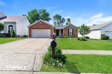 Mason house for rent - a home with a parking meter in front of a driveway