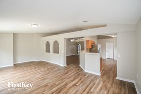 Middleburg house for rent - an open living room and kitchen with wood flooring