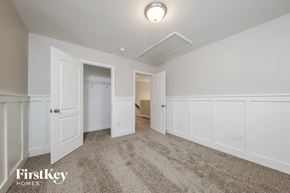 Clemmons house for rent - a bedroom with white walls and carpet and a door to a closet
