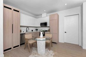 Los Angeles apartment for rent - a kitchen and dining room with a table and chairs
