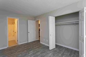 Columbia apartment for rent - a bedroom with a closet and a door to a bathroom