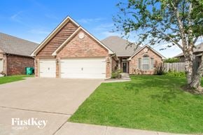 Yukon house for rent - A brick house with a garage is for sale.
