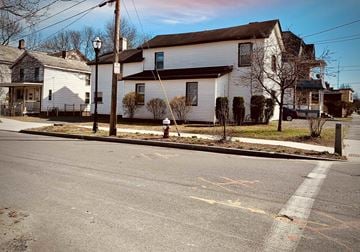 Westfield apartment for rent - A white house with a black roof and a fire hydrant in front of it.