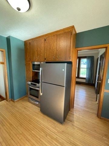 Norwood Young America house for rent - a kitchen with a stainless steel refrigerator