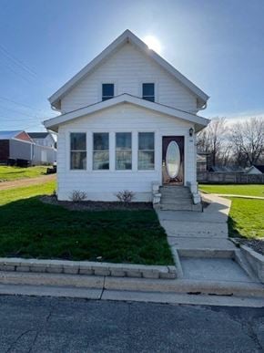 Norwood Young America house for rent - a small white house with a white door and a lawn