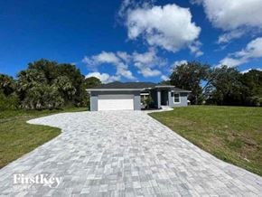Port Charlotte house for rent - A house with a driveway in front of it is for sale.