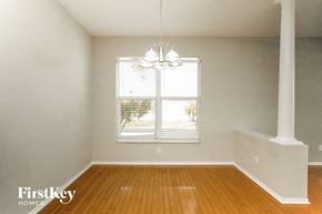 Davenport house for rent - a living room with wood floors and a window