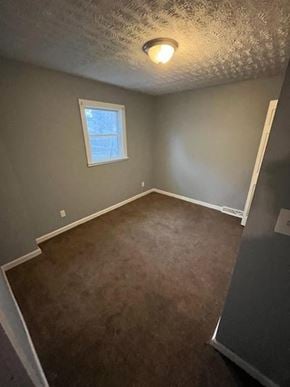 Akron apartment for rent - A room with a window and a brown carpet.