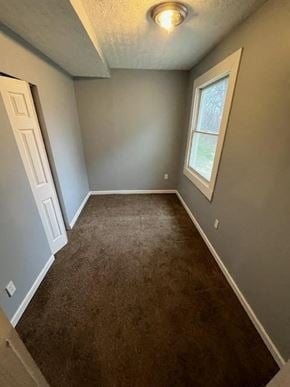 Akron apartment for rent - A room with a brown carpet and a window.