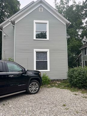 Akron apartment for rent - a house with a car parked in front of it