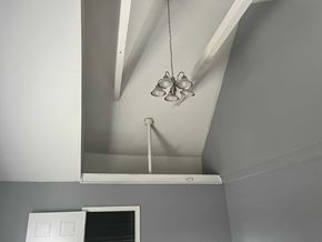 Akron apartment for rent - a view of the ceiling in a room with grey walls and a ceiling fan