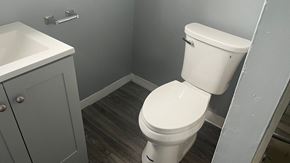 Akron apartment for rent - a bathroom with a toilet and a sink