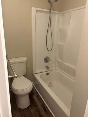 Akron apartment for rent - a bathroom with a toilet and a shower