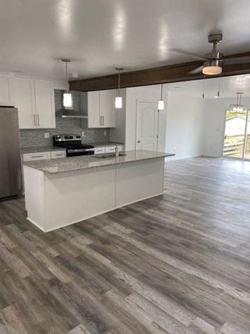 Cleveland house for rent - a kitchen with a counter top and a refrigerator