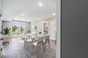 Washington apartment for rent - A dining room with a table set for four.