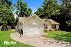 Sugar Hill house for rent - a small white house with a white garage door