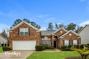 Moncks Corner house for rent - A brick house with a garage door and a sign that says FirstKey Homes.