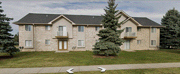 Sterling Heights apartment for rent - an apartment building with a large tree in front of it