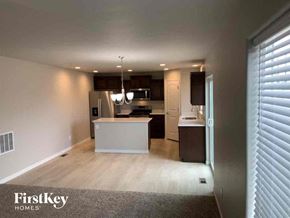 Colorado Springs house for rent - an open kitchen and living room in a house