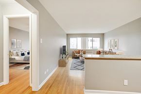 Denver apartment for rent - an open living room with a kitchen and a living room