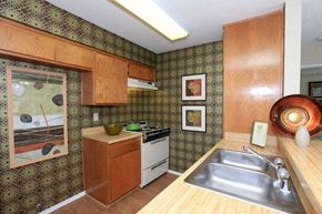 Santa Clarita apartment for rent - a kitchen with a sink a stove and a sink